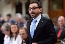 Too early to set a date on loosening travel restrictions, transport minister says-Milenio Stadium-Canada