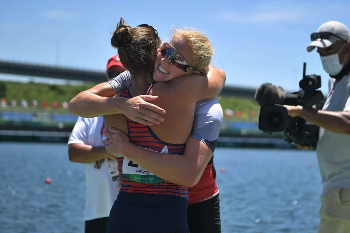 Vincent Lapointe hugs gold medallist Nevin Harrison-Milenio Stadium-Canada