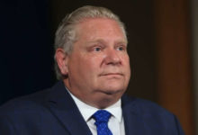 Ontario sees 927 new COVID-19 cases as Ford calls for travel ban in response to new variant-Milenio Stadium-Ontario