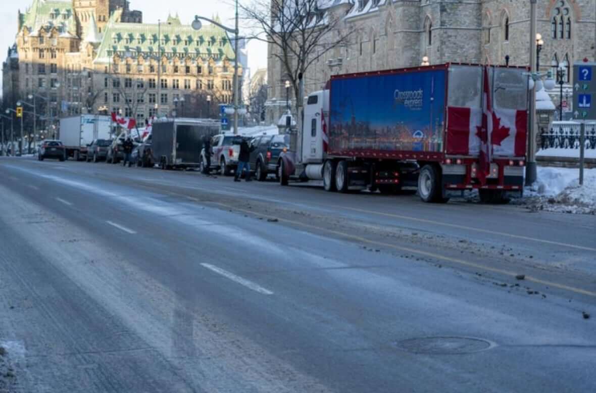 Trucks parked in front of Parliament Hill in Ottawa-Milenio Stadium-Canada