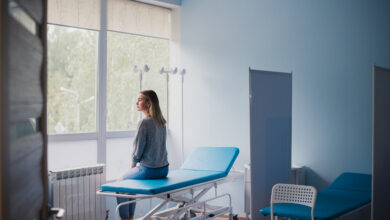Woman waiting for doctor in hospital