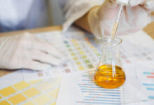 woman-making-urine-test-with-ph-material-in-labora-2023-03-13-18-51-19-utc